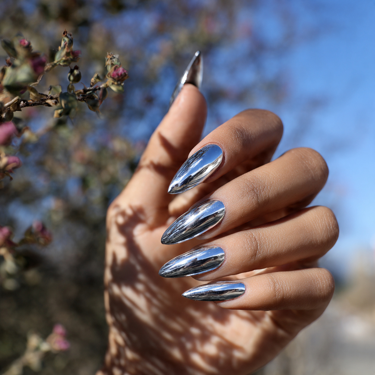 Stunning Silver Chrome Nails for a Futuristic Look 12 Liquid Silver Stiletto Edge