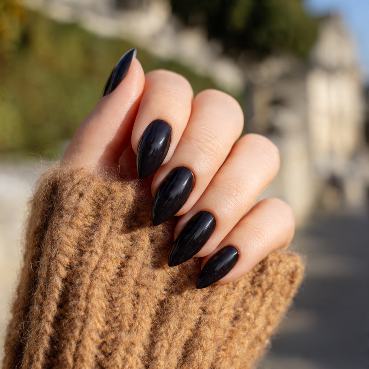 Chic Black Almond Nails for a Modern Look 3 Satin Noir Moments