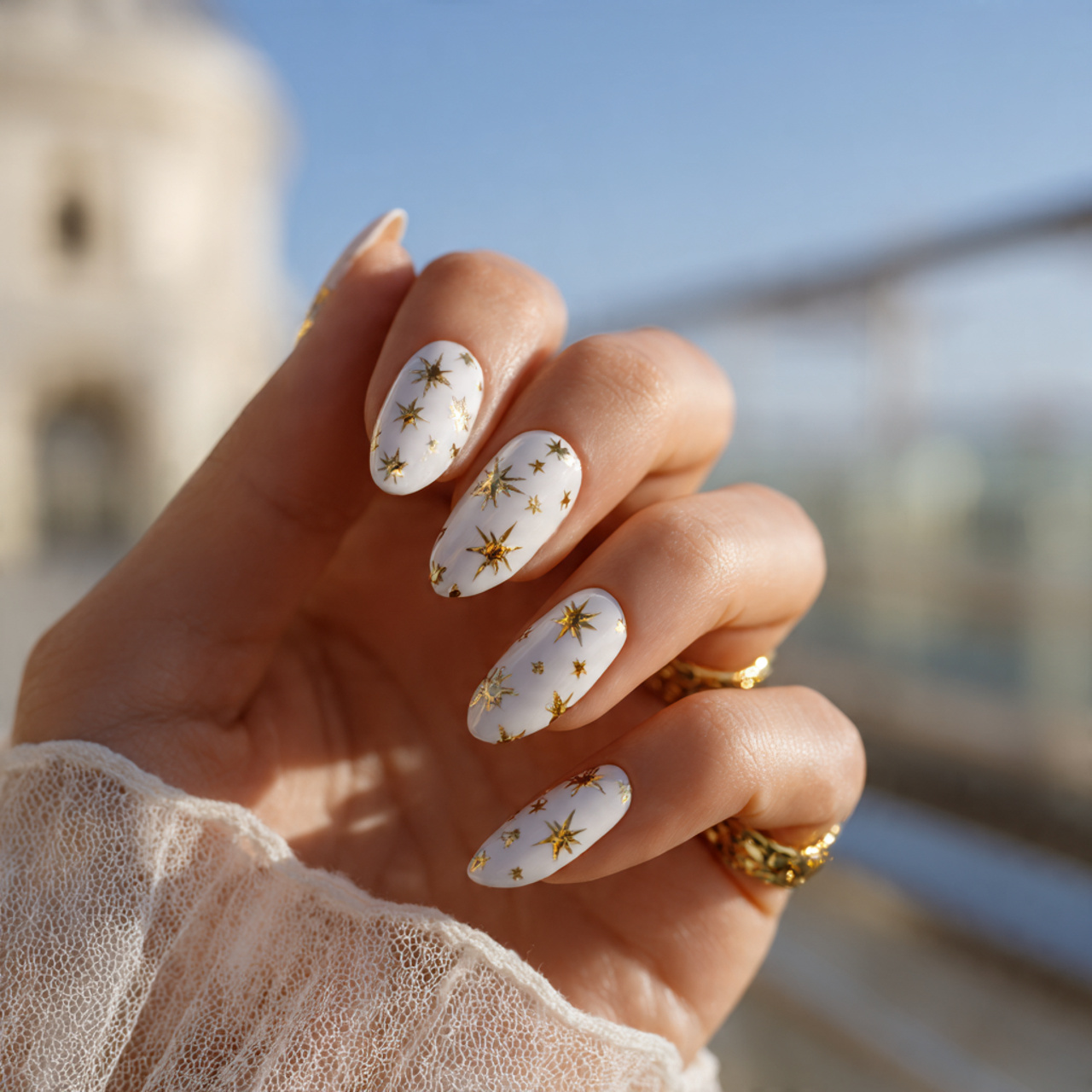 White Almond Nails with Gold Stars